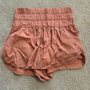 FP MOVEMENT pink athletic shorts with cinched waist & mesh back pocket